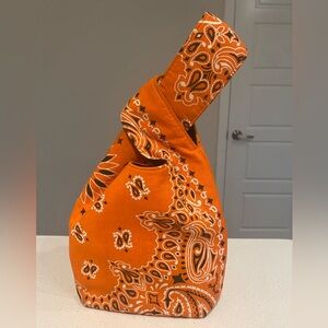 Yaito knot bag in orange and black